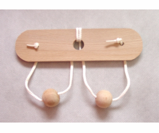 Dřevěný hlavolam prsa